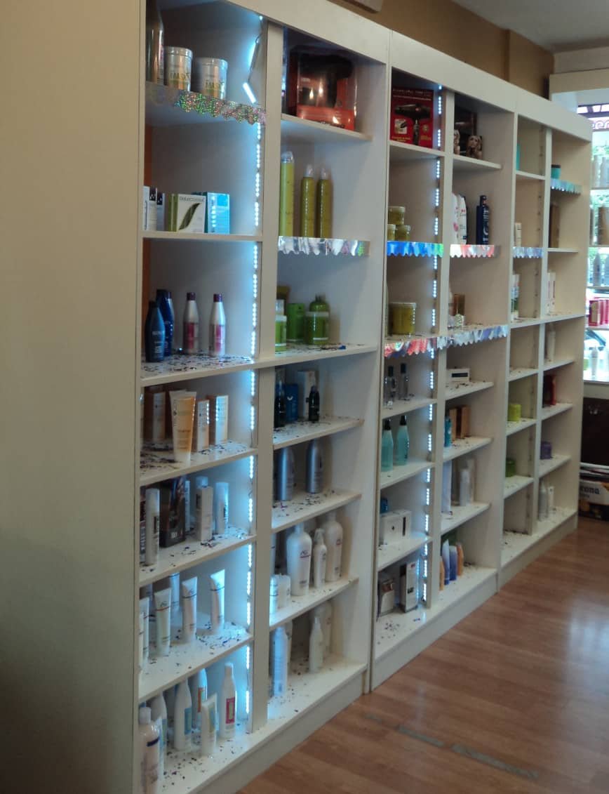 retail display shelves in white and lights , it 8 feet by 4